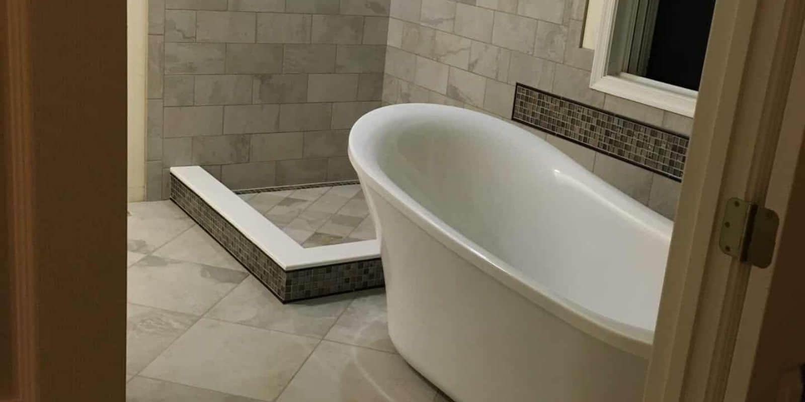 freestanding tub design in elegant master bathroom remodel